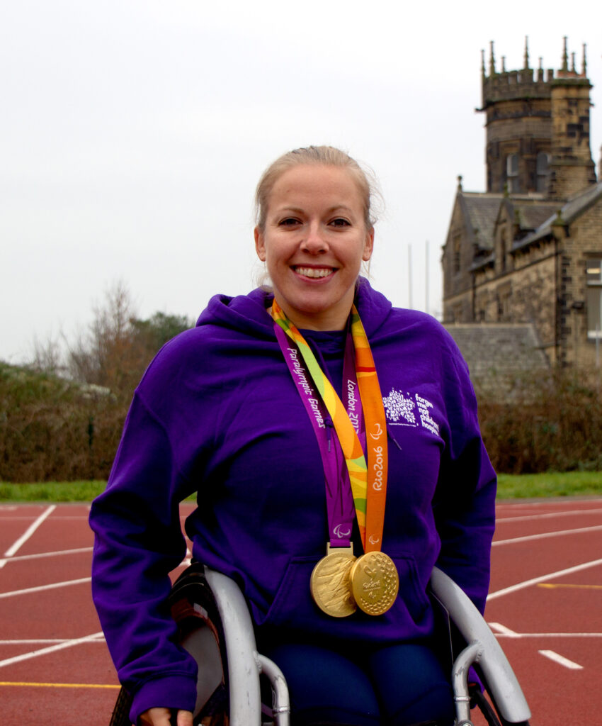 Hannah Cockroft wearing medals